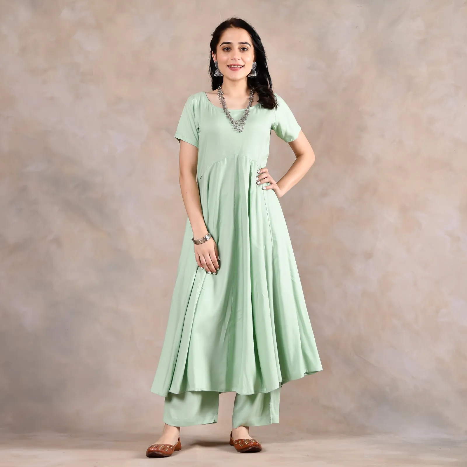 Mint Green Flared Kurta Pant Set with Pink Scalloped Dupatta