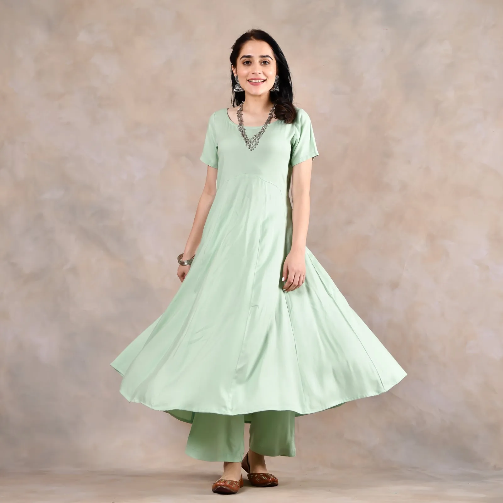 Mint Green Flared Kurta Pant Set with Pink Scalloped Dupatta