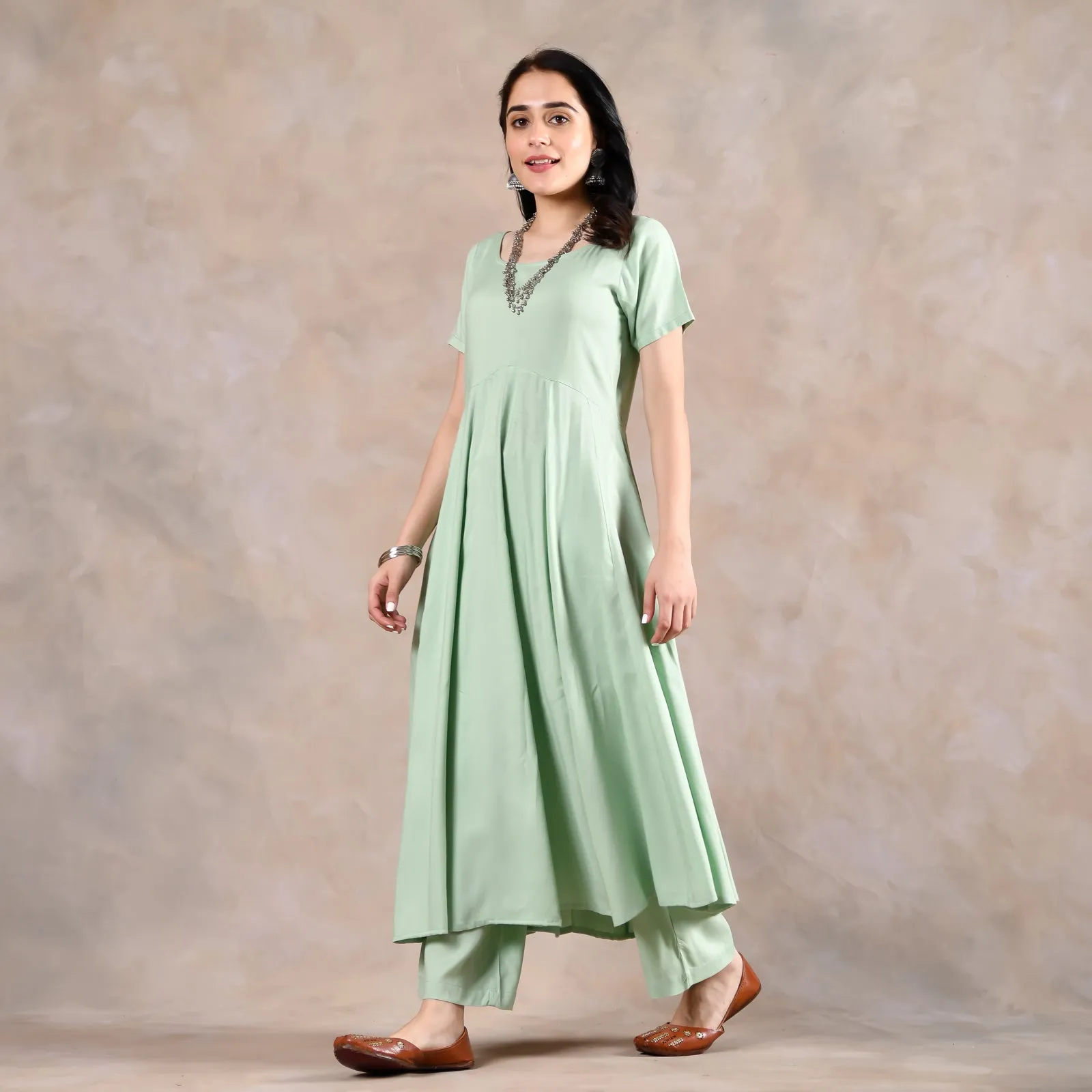 Mint Green Flared Kurta Pant Set with Pink Scalloped Dupatta